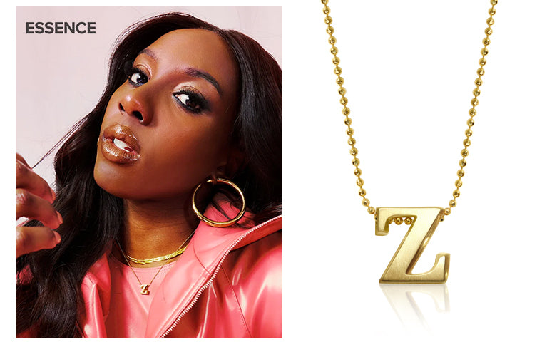 Ziwe wearing Alex Woo Little Letter Z in 14kt Yellow Gold