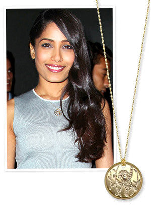 Instyle - What's Right Now! Why Freida Pinto Wears a Chimpanzee Necklace